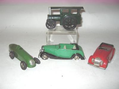 Appraisal: Four Minic clockwork tinplate toys comprising Red Airflow Type four