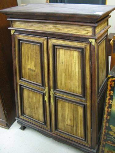 Appraisal: CHINESE SIDE CABINET of teakwood construction with applied bamboo reeds