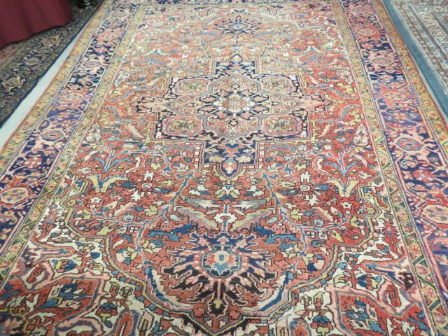 Appraisal: Heriz Persian Handmade Room Size Rug overall stylized florals earthtones