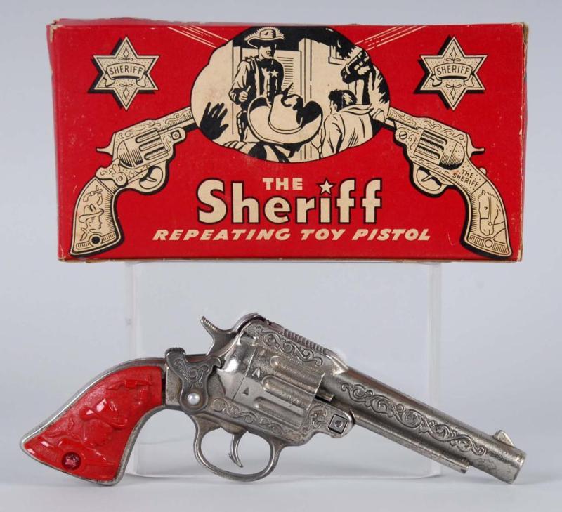 Appraisal: The Sheriff Cap Gun Description Left grip is pushed in