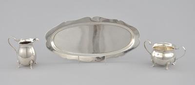 Appraisal: A Sterling Silver Sugar Creamer and Tray The double handle