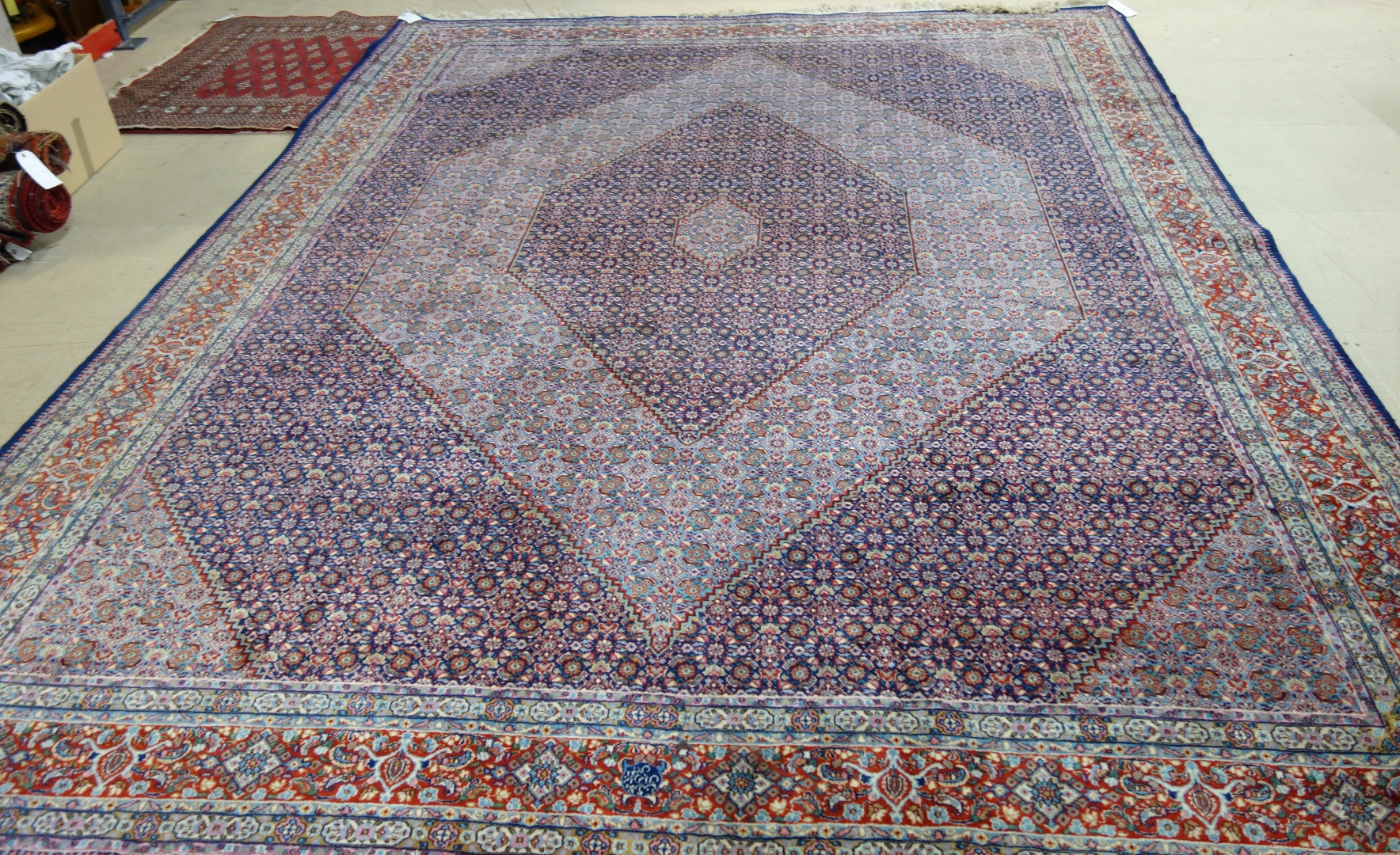 Appraisal: A Senneh carpet Persian the field with decreasing diamonds in