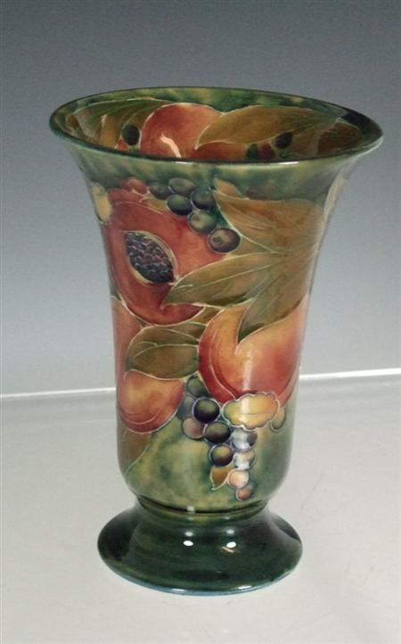 Appraisal: MOORCROFT FOR LIBERTY CO TAPERED VASE CIRCA glazed earthenware decorated