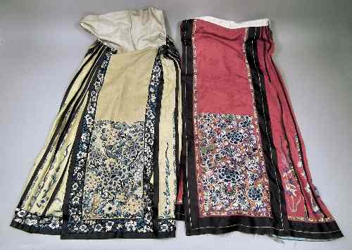 Appraisal: A Chinese wine silk pleated wrap around skirt the two