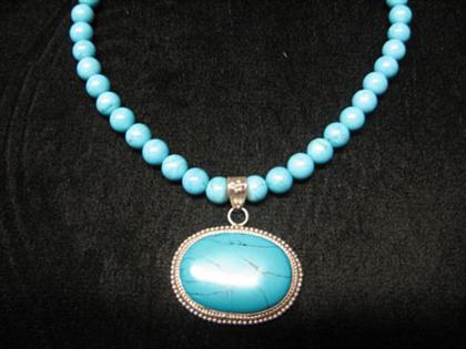 Appraisal: Turquoise and sterling silver bead necklace Forty mm turquoise beads