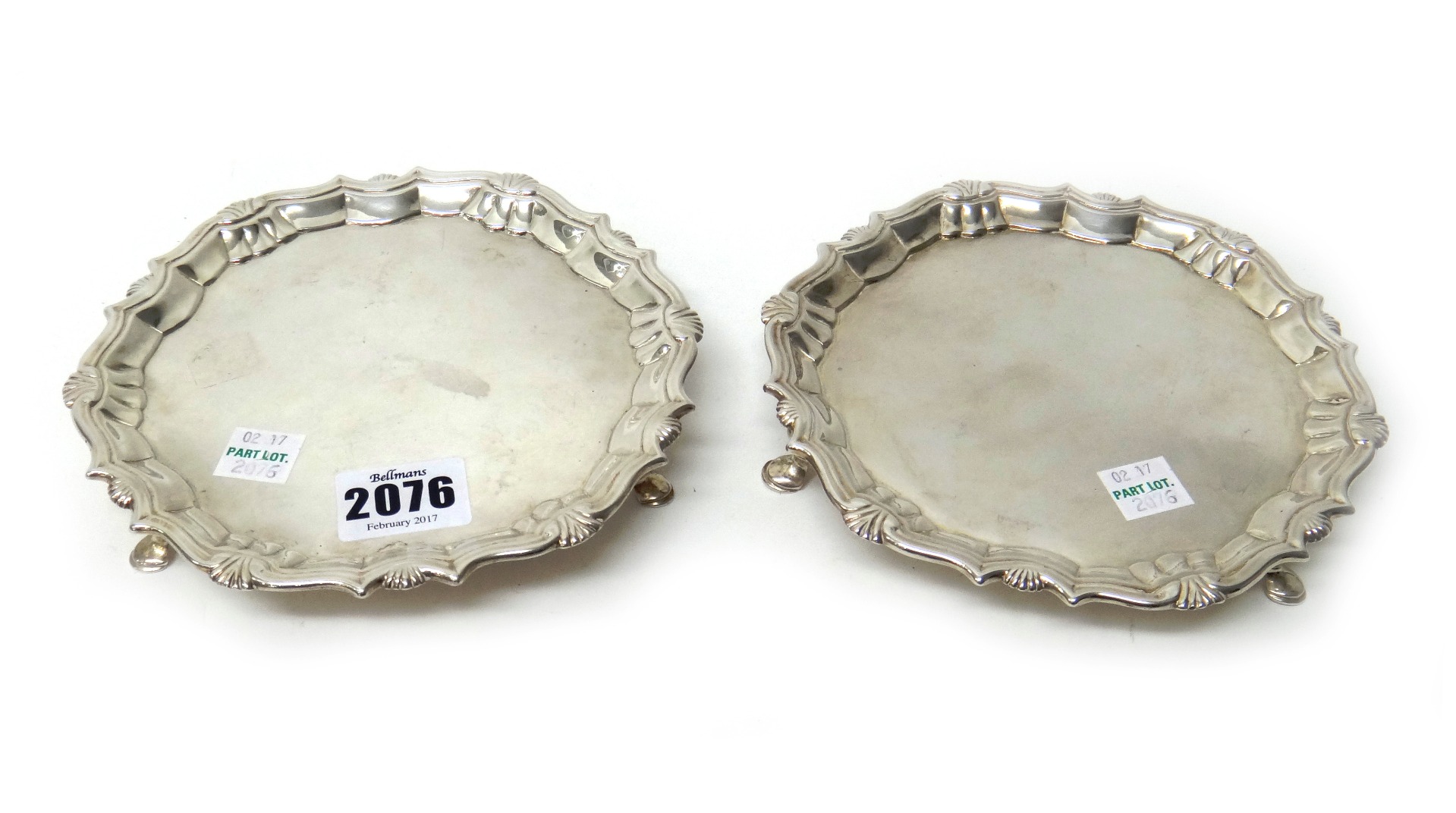 Appraisal: A pair of George II silver waiters each of shaped