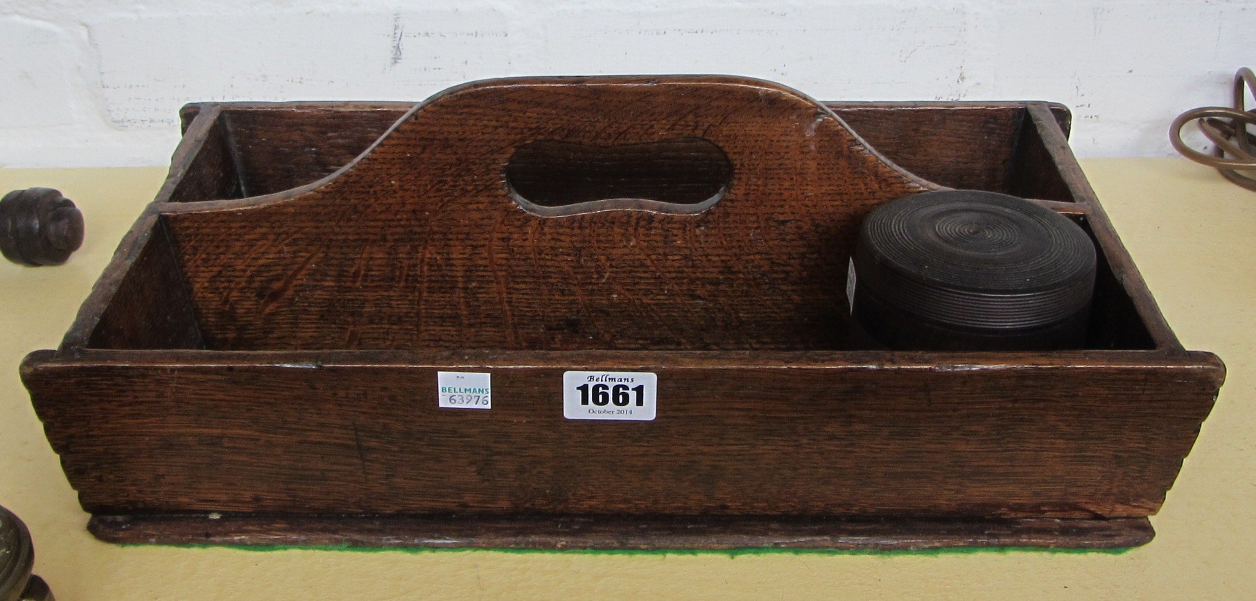 Appraisal: An oak housemaid's two division tray with central handle cm