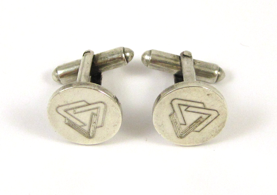 Appraisal: PAIR OF TIFFANY CO STERLING CUFFLINKS each with a round