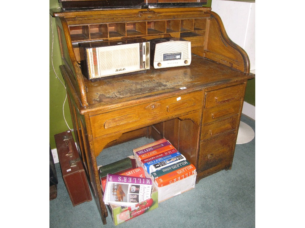 Appraisal: Oak single pedestal roll top desk