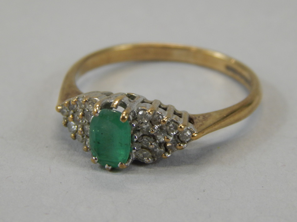 Appraisal: A ct gold dress ring claw set with green stone