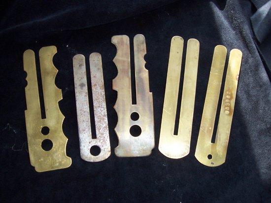 Appraisal: Five brass button polishing guards