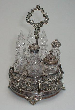 Appraisal: A Victorian silver plated seven bottle cruet the stand with