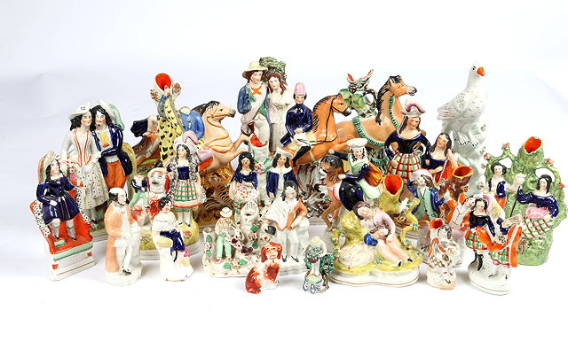 Appraisal: A COLLECTION OF TH CENTURY STAFFORDSHIRE FIGURES subjects including highland