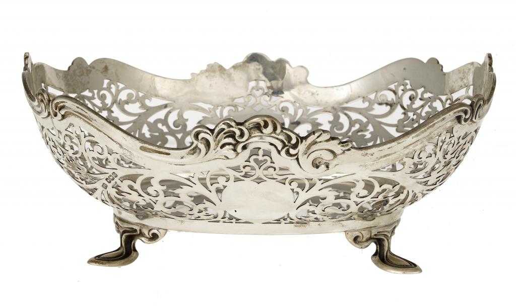 Appraisal: A GEORGE V PIERCED OBLONG FRUIT BOWL with rounded sides