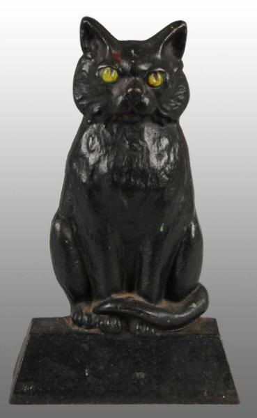 Appraisal: Cast Iron Sitting Cat on Base Doorstop Description Made by