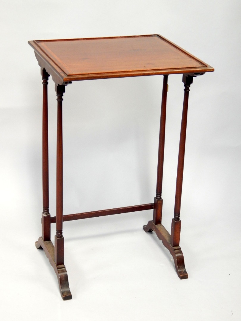 Appraisal: A Sheraton style inlaid mahogany occasional table with rectangular top