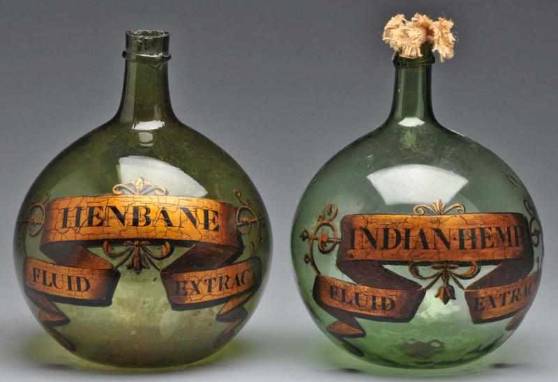 Appraisal: Lot of Green Demijohn Apothecary Show Bottles Description Green demijohn