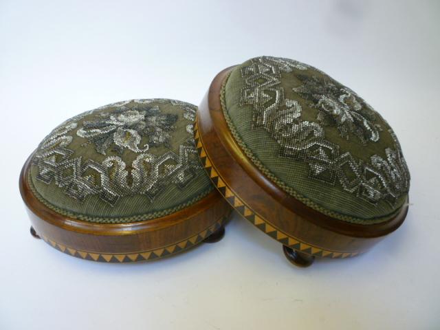 Appraisal: A PAIR OF VICTORIAN WALNUT BEADWORK FOOTSTOOLS of circular form