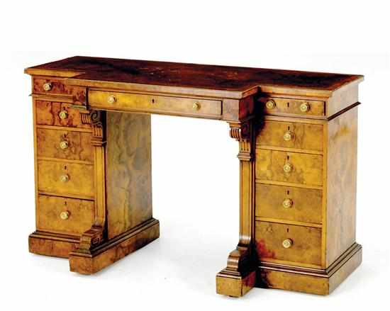 Appraisal: English walnut pedestal desk stamped Gillow th century T-shaped gilt-tooled