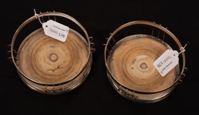 Appraisal: A pair of Sheffield plate circular coasters with wirework borders