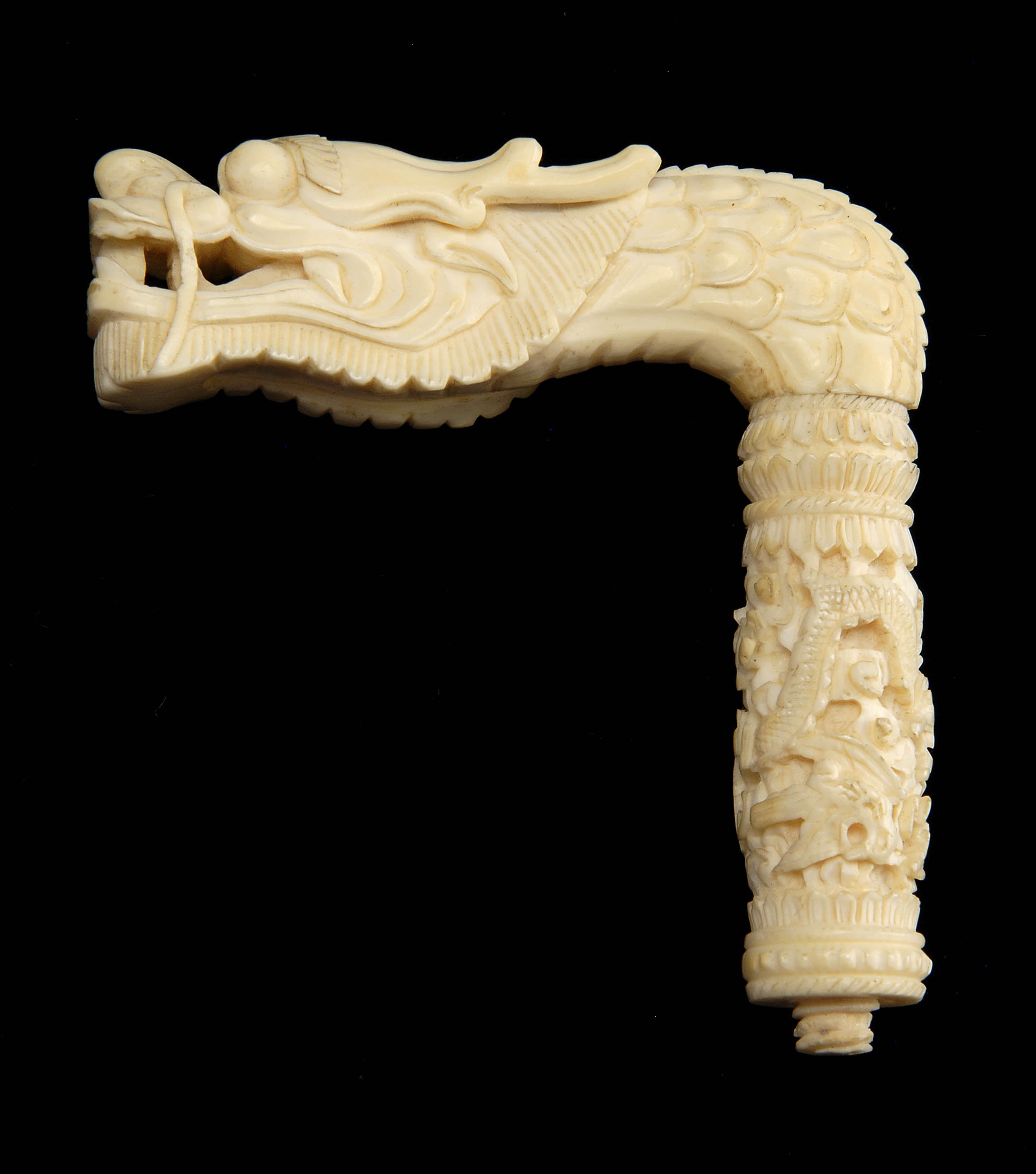 Appraisal: EXPORT IVORY CANE HANDLE Circa In the form of a