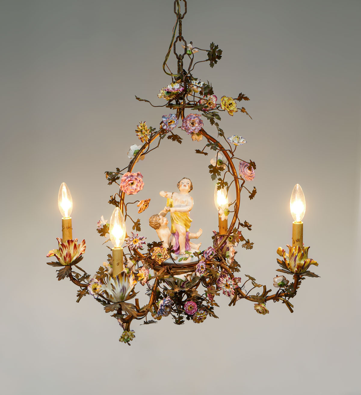 Appraisal: FANCY ITALIAN GILT METAL AND PORCELAIN CHERUB CHANDELIER - light