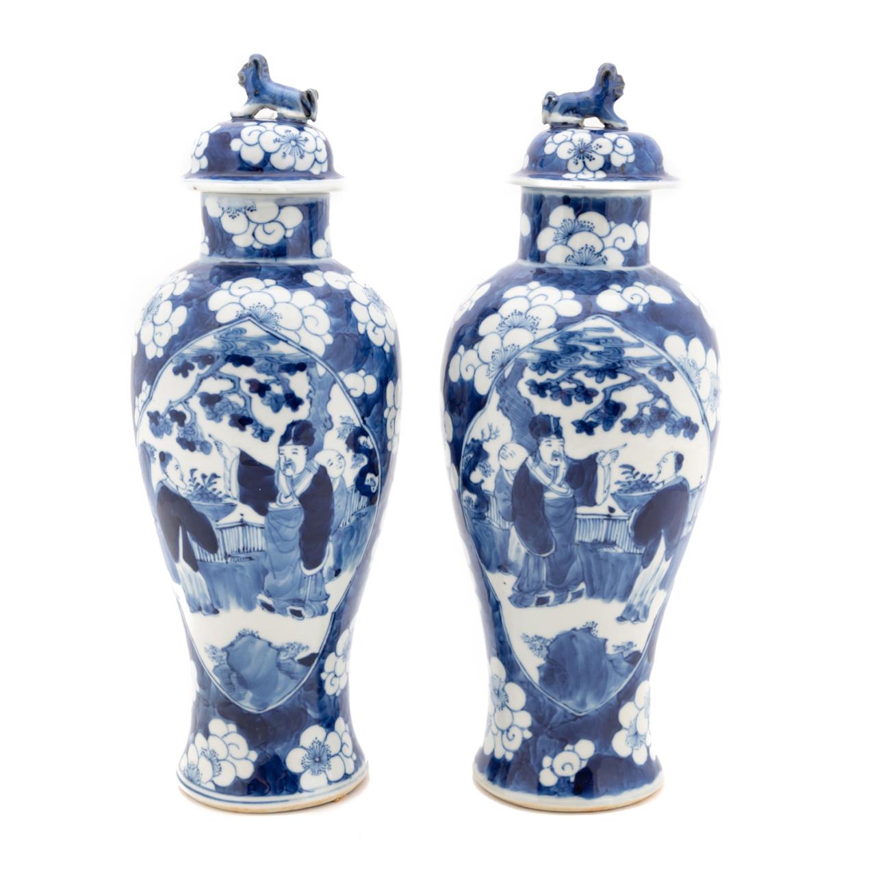 Appraisal: PAIR OF CHINESE BLUE AND WHITE LIDDED URNS Pair of