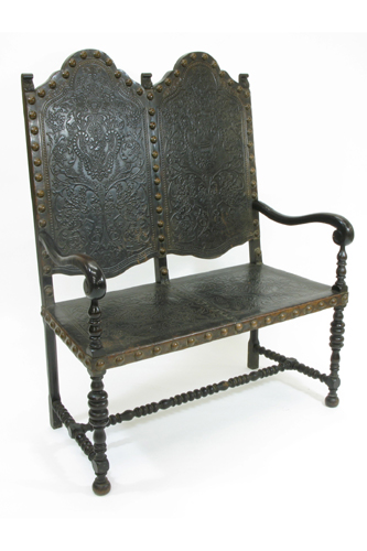 Appraisal: SPANISH BAROQUE STYLE WALNUT AND TOOLED LEATHER SETTEE late th