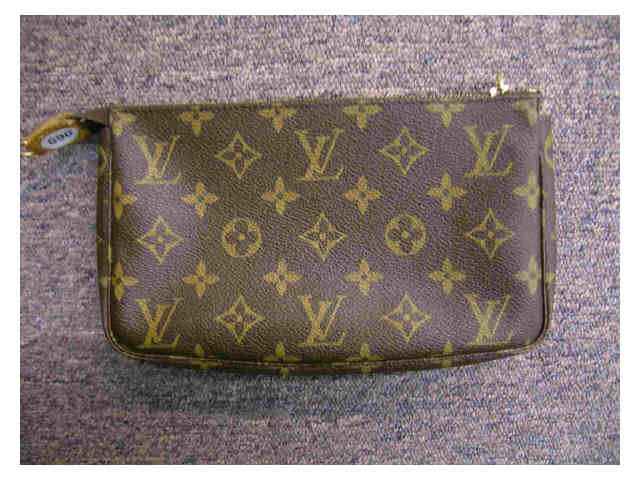 Appraisal: Louis Vuitton brown monogram zipper closure accessory bag