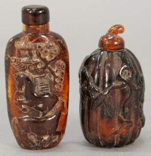 Appraisal: Two large amber snuff bottles including one depicting horses with