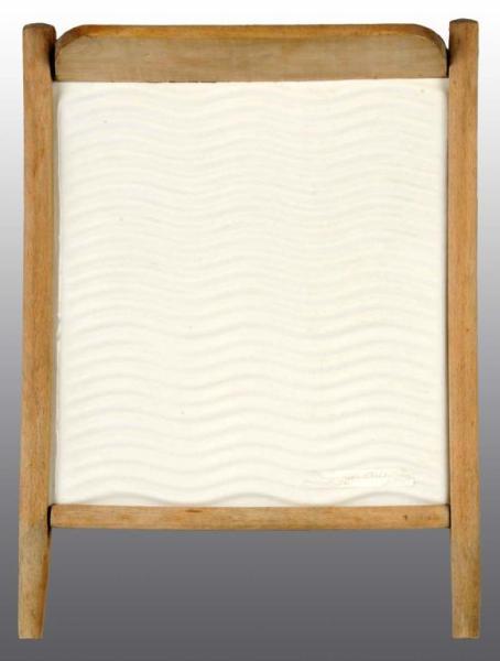 Appraisal: Pottery Washboard Description White pottery board with wave pattern Condition