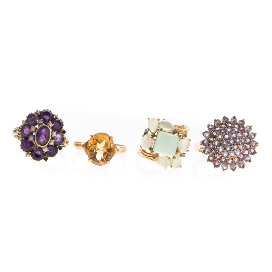 Appraisal: Four Gemstone Cluster rings in Gold K yellow gold ring