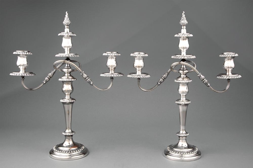 Appraisal: Pair of Georgian-Style Silverplate Three-Light Candelabra th c removable flame