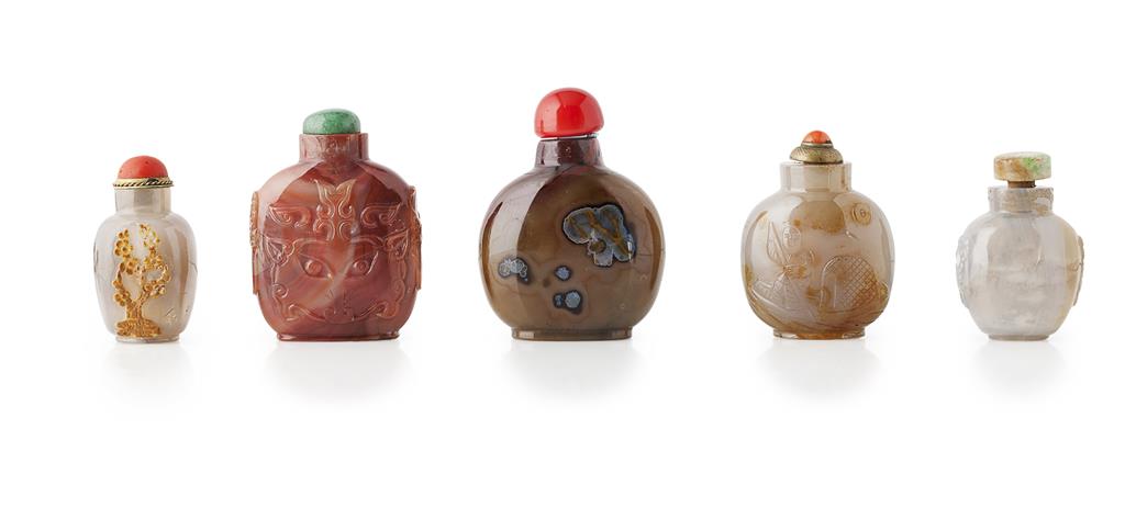 Appraisal: FIVE AGATE SNUFF BOTTLES one large bottle of red hue