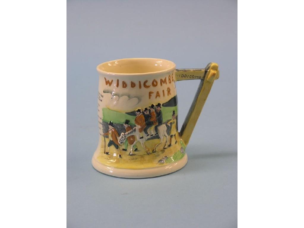 Appraisal: A Fielding's Crown Devon musical mug Widdecombe Fair in and