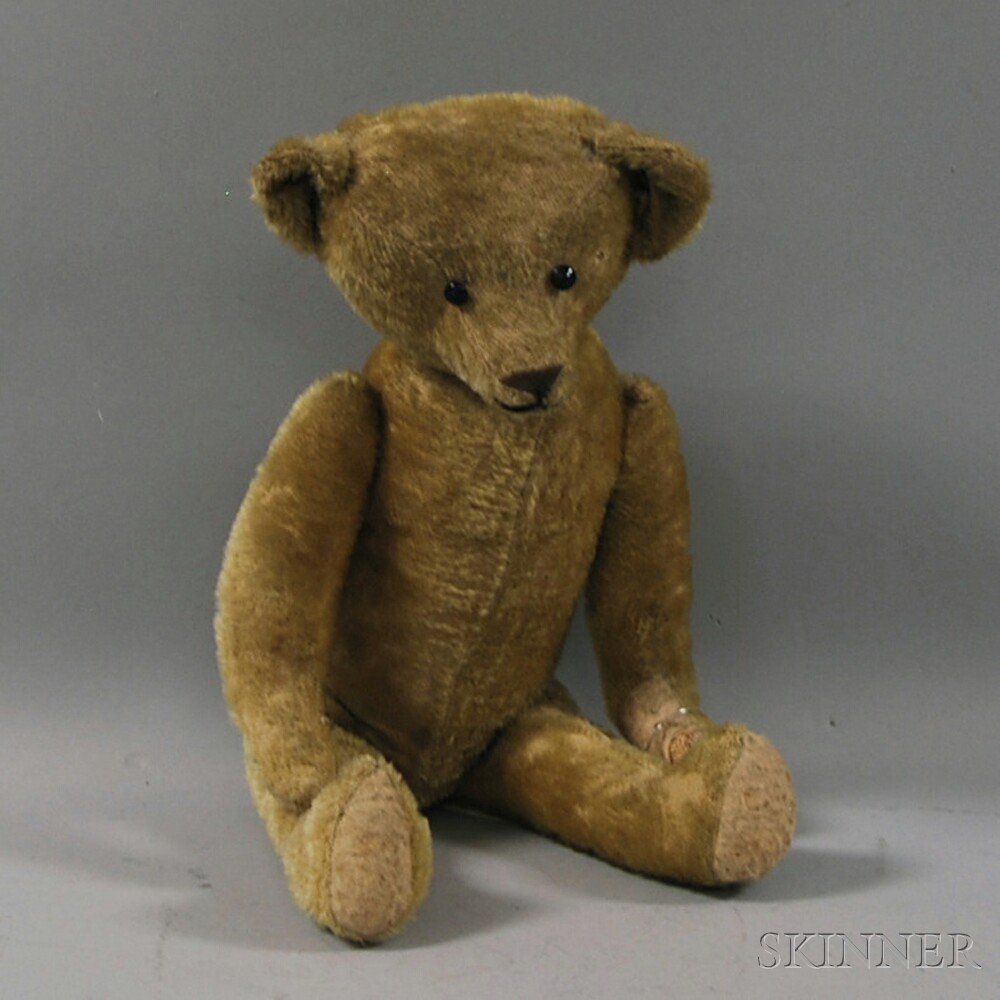 Appraisal: Jointed Golden Mohair Teddy Bear c s black button eyes