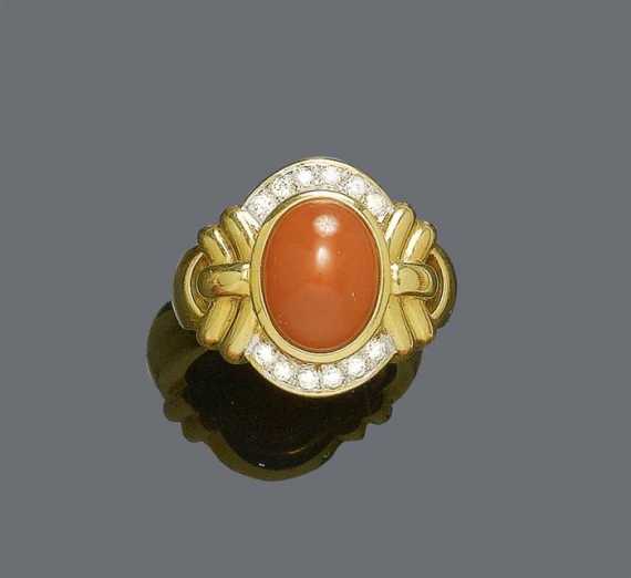 Appraisal: CORAL DIAMOND AND GOLD RING Yellow gold Casual-elegant ring with