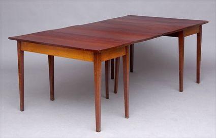 Appraisal: FEDERAL MAHOGANY TWO-PART DROP-LEAF DINING TABLE Each overhanging top with