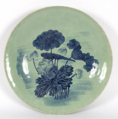 Appraisal: A Chinese celadon plate with water lily decoration in underglaze