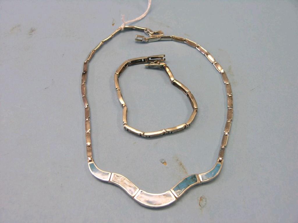 Appraisal: A silver and turquoise-set necklace and a silver Greek-key pattern