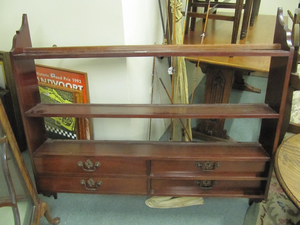 Appraisal: Edwardian mahogany wall hanging plate rack with drawers