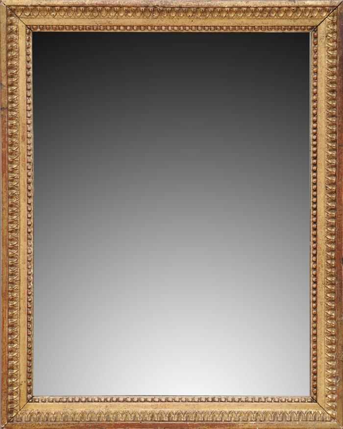 Appraisal: LOUIS XVI CARVED GILTWOOD RECTANGULAR MIRROR With bead and petal-tip