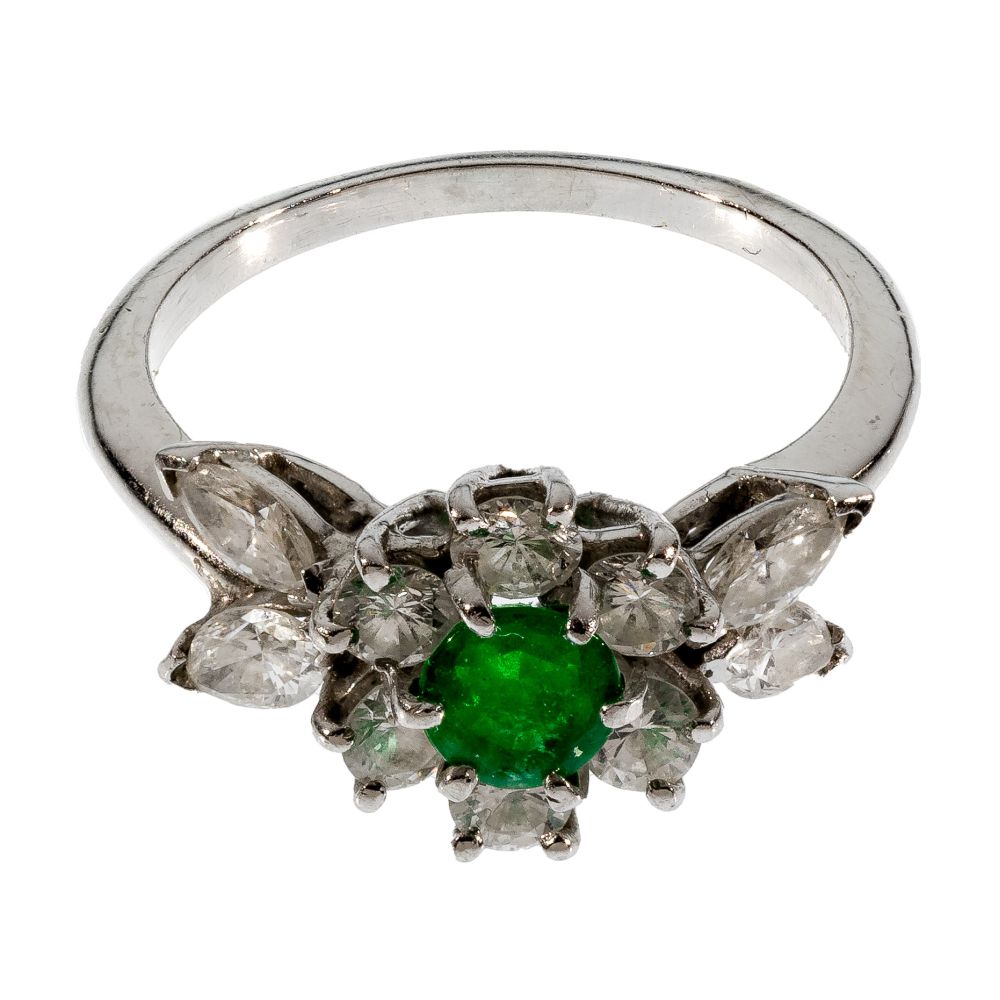 Appraisal: PLATINUM EMERALD AND DIAMOND RINGHaving a round cut emerald measuring