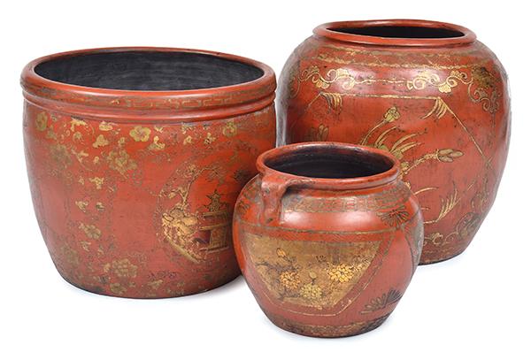 Appraisal: THREE RED PAINTED AND GILT EARTHENWARE VESSELS two of globular