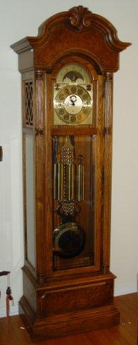 Appraisal: HOWARD MILLER MOONPHASE GRANDFATHER CLOCK Circa model - oak case