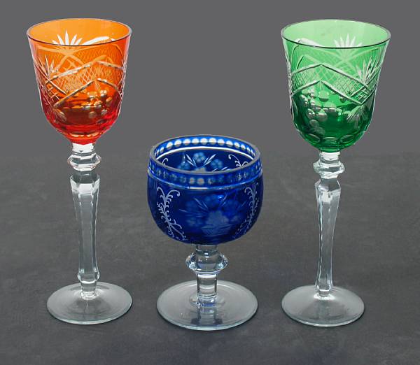 Appraisal: A group of fifty four colored cut glass stemware goblets