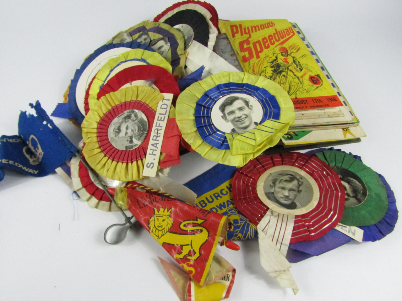 Appraisal: Speedway Winners rosettes and pennants and various programmes s hole