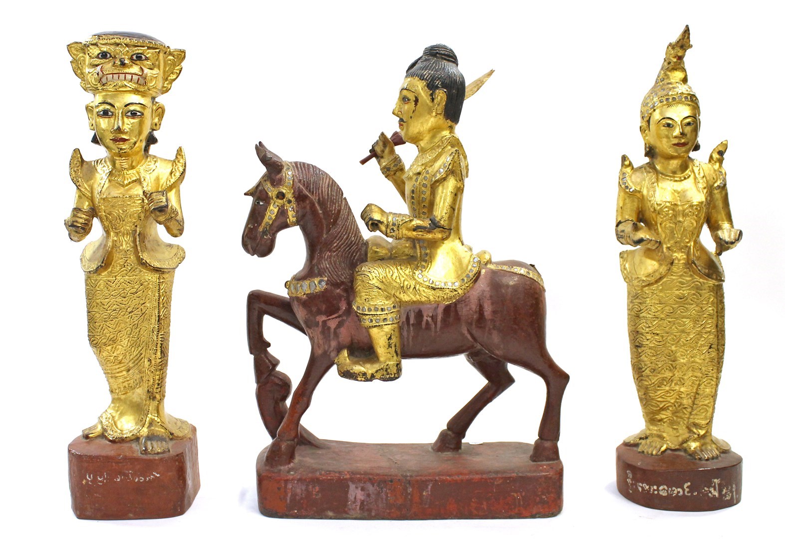 Appraisal: Two Thai giltwood figures of women th century each standing