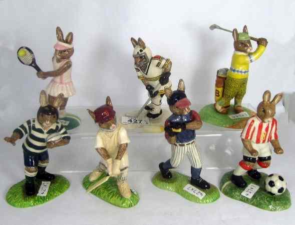 Appraisal: Royal Doulton Bunnykins Figures from the Pastimes Series comprising Slapshot