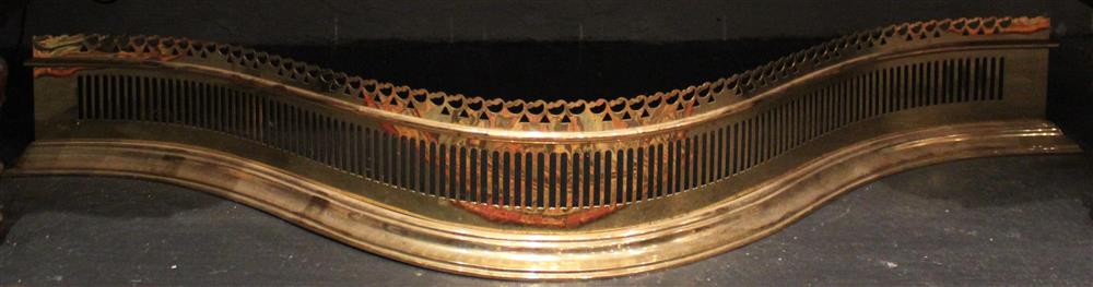 Appraisal: VIRGINIA METALCRAFTERS SERPENTINE BRASS FIREPLACE FENDER having a serpentine form